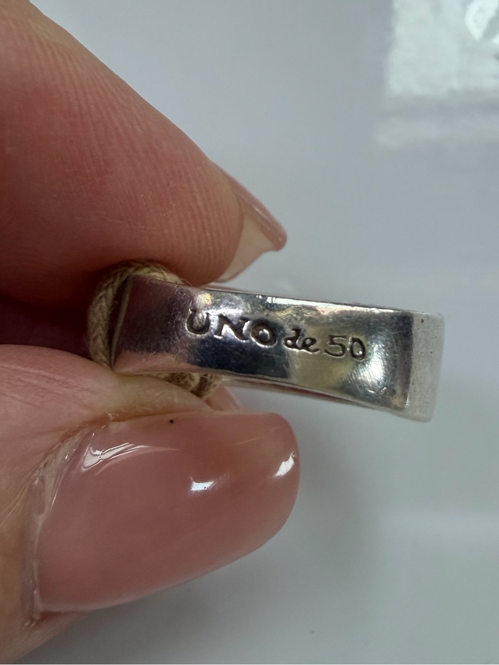UNO de 50 Silver Stamped Logo Band. Size 6”